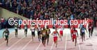 Usain Bold takes Jamaica into the lead and on to victory in the 4 x 100 metres at the Commonwealth Games, Glasgow. Photo: David T. Hewitson/Sports for All Pics